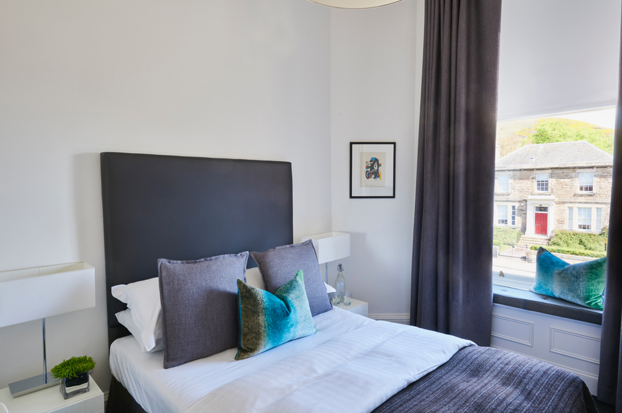 Aberlour bedroom at 94DR — bright double with window seat