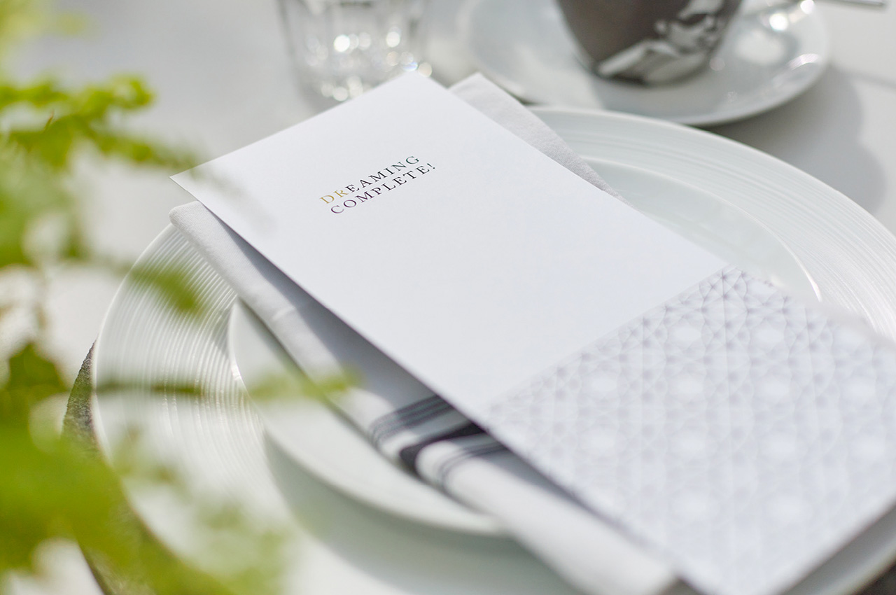 A place setting at 94DR with the message ‘Dreaming complete!’