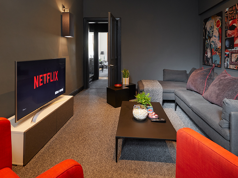 94DR Media Room with cosy seating and Netflix screen