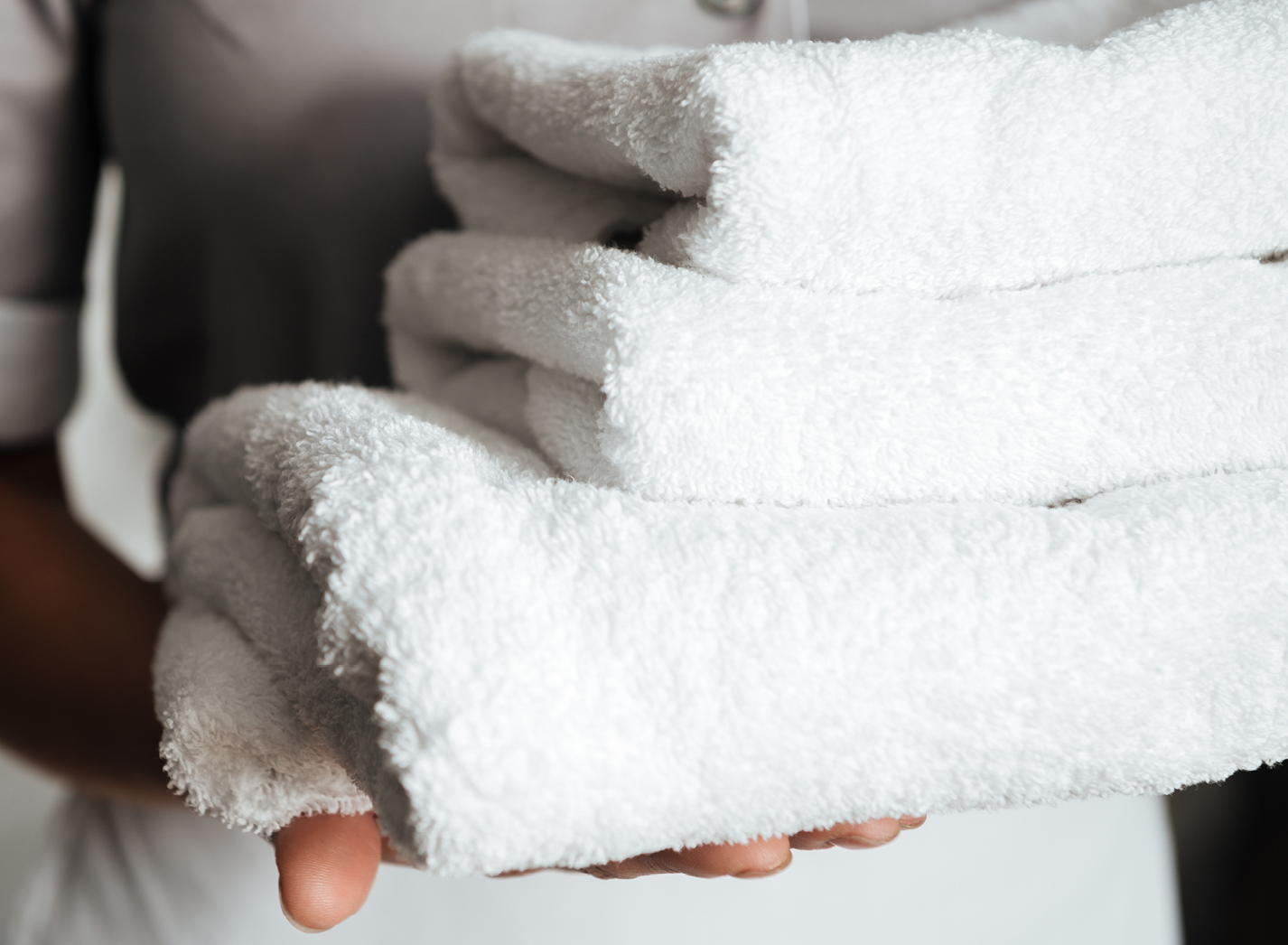 Freshly folded towels prepared by the 94DR housekeeping team